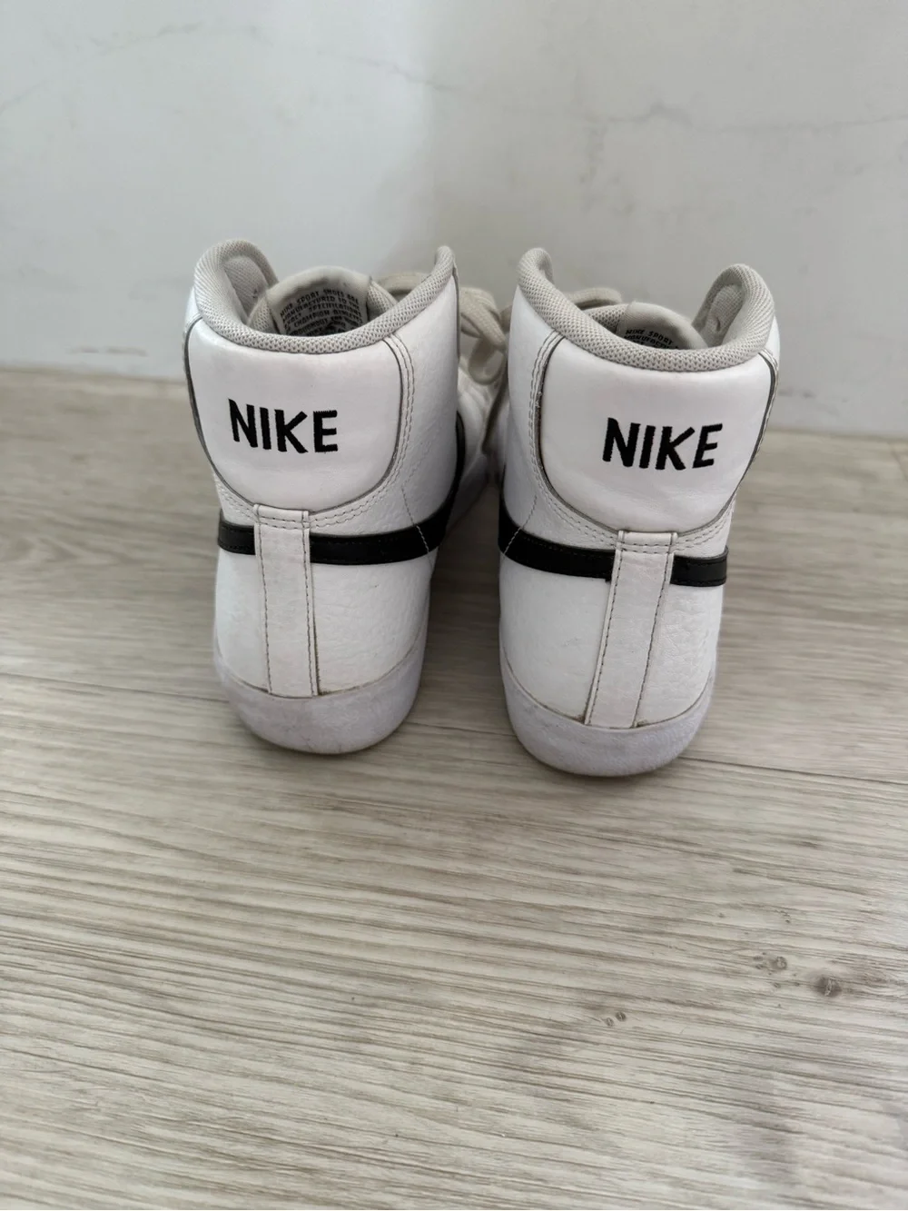 Nike Blazer Mid '77 White High-Top Sneakers with Black Swoosh